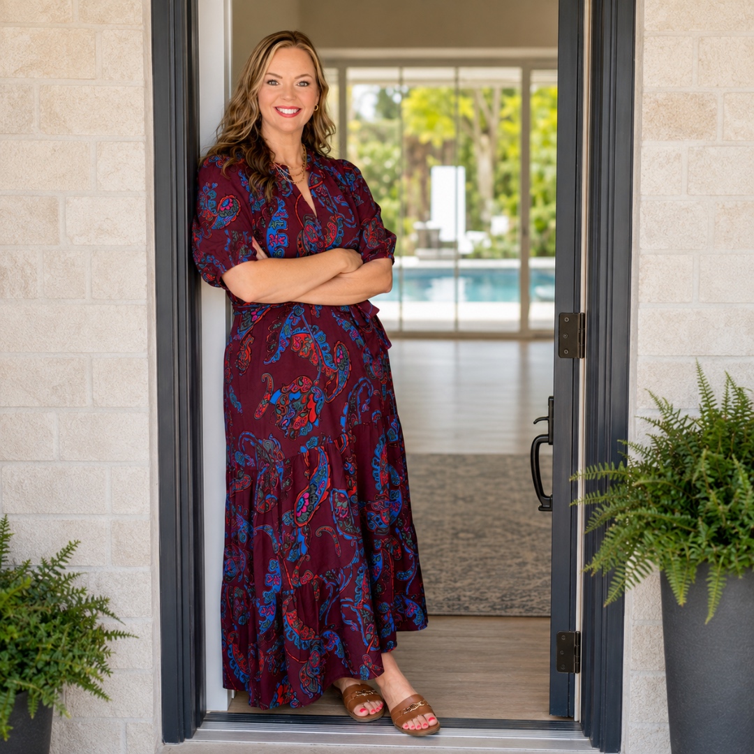 Nikki Gillespie standing in an open doorway of a CenLA home